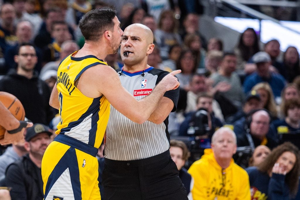 Dec 26, 2025; Indianapolis, Indiana, USA; Indiana Pacers guard T.J. McConnell (9) gets into an altercation with Boston Celtics guard Jordan Walsh (27) in the second half at Gainbridge Fieldhouse. Mandatory Credit: Trevor Ruszkowski-Imagn Images