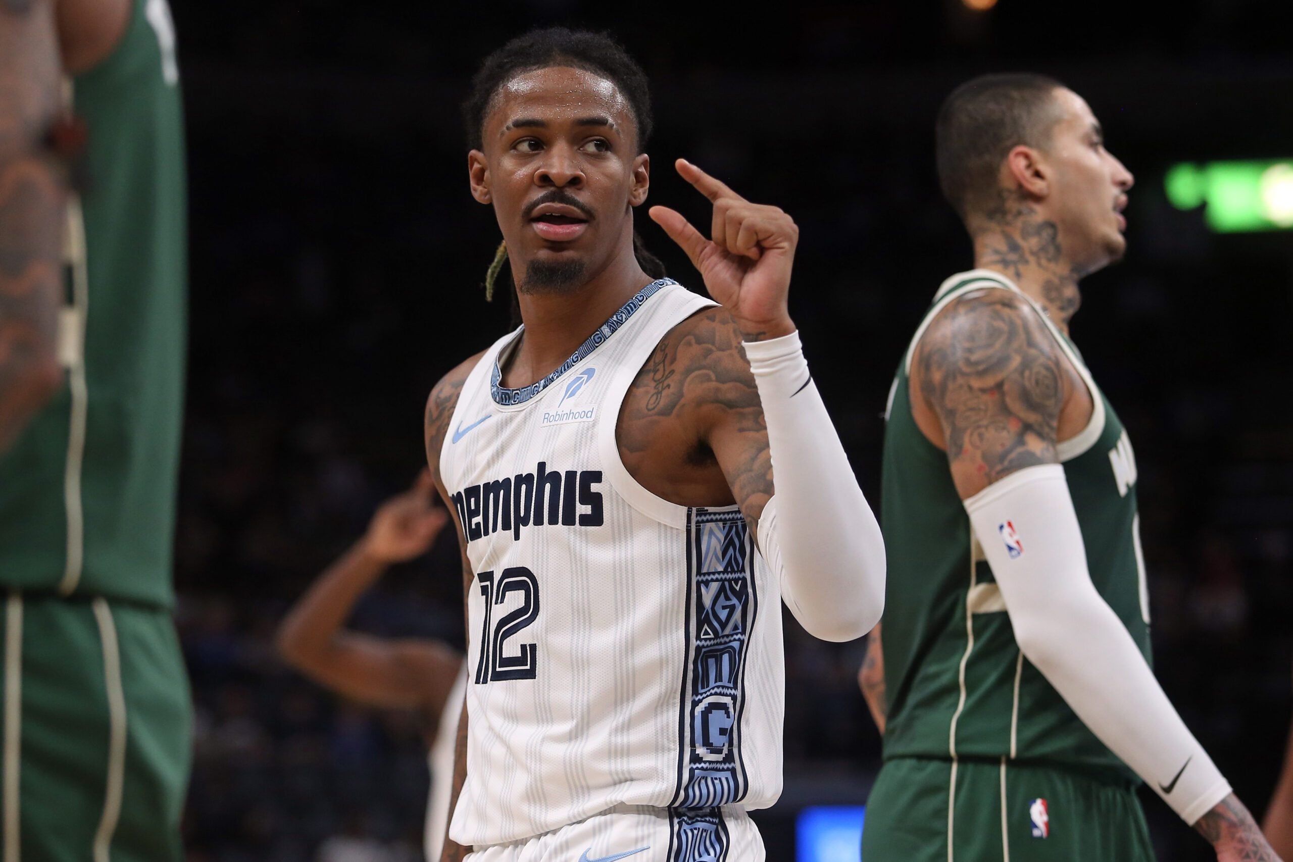 Dec 26, 2025; Memphis, Tennessee, USA; Memphis Grizzlies guard Ja Morant (12) gestures during the third quarter against the Milwaukee Bucks at FedExForum. Mandatory Credit: Petre Thomas-Imagn Images
