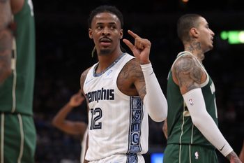 Dec 26, 2025; Memphis, Tennessee, USA; Memphis Grizzlies guard Ja Morant (12) gestures during the third quarter against the Milwaukee Bucks at FedExForum. Mandatory Credit: Petre Thomas-Imagn Images