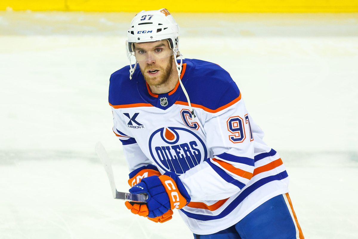 Dec 27, 2025; Calgary, Alberta, CAN; Edmonton Oilers center Connor McDavid (97) skates during the warmup period against the Calgary Flames at Scotiabank Saddledome. Mandatory Credit: Sergei Belski-Imagn Images