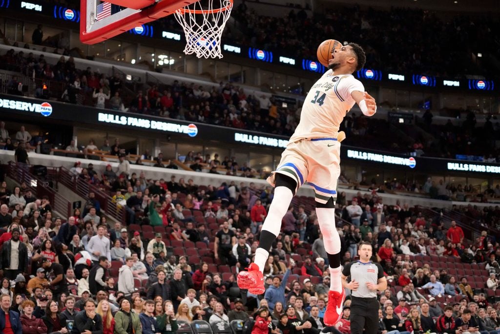 Dec 27, 2025; Chicago, Illinois, USA; Milwaukee Bucks forward Giannis Antetokounmpo (34) goes up for a dunk against the Chicago Bulls during the second half at United Center. Mandatory Credit: David Banks-Imagn Images