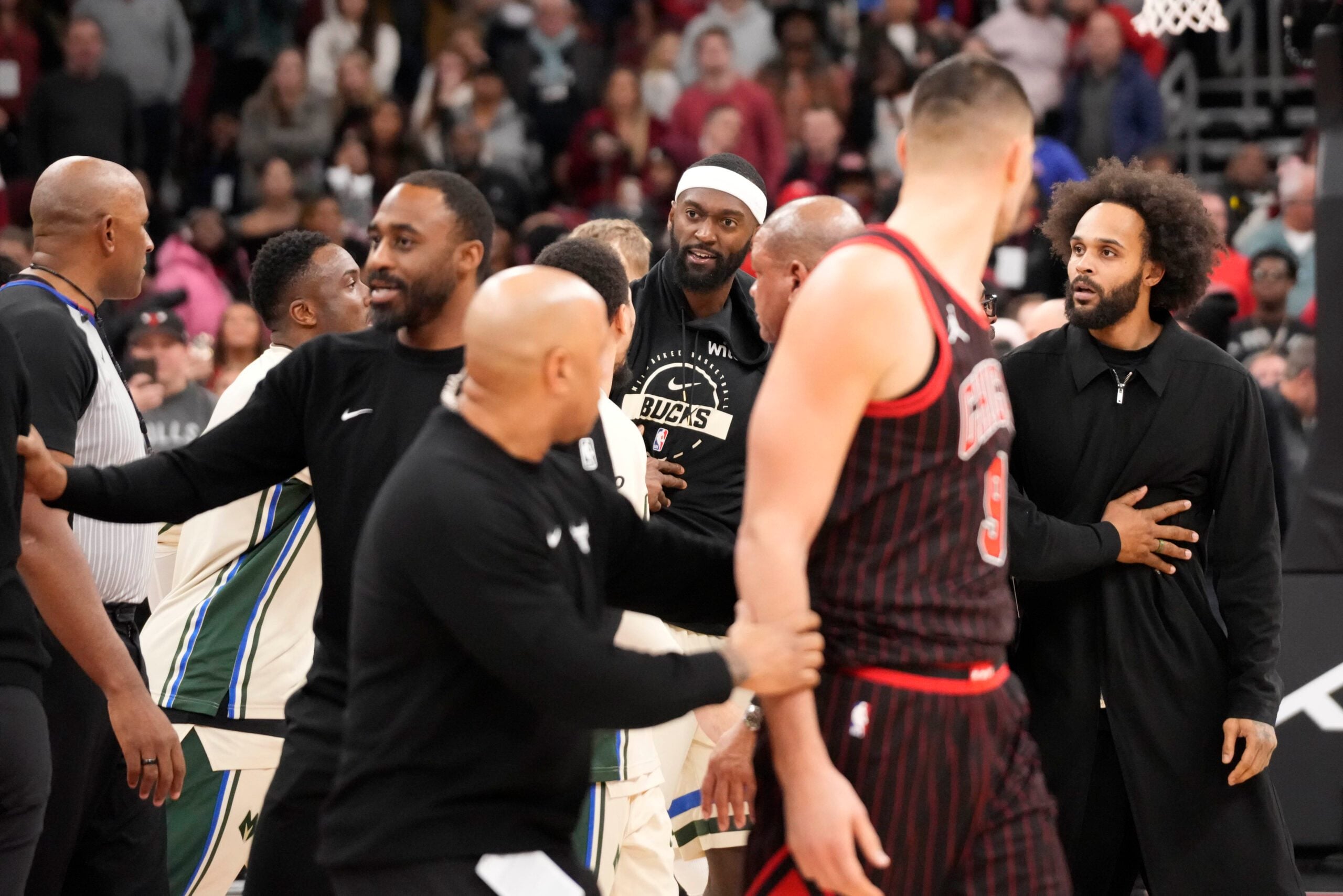 Dec 27, 2025; Chicago, Illinois, USA; Milwaukee Bucks and Chicago Bulls get into a scrum as the game ends at United Center. Mandatory Credit: David Banks-Imagn Images