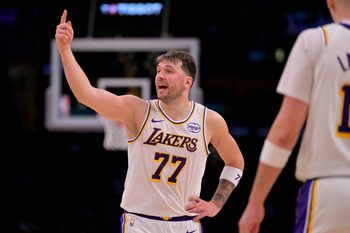 Dec 28, 2025; Los Angeles, California, USA;   Los Angeles Lakers guard Luka Doncic (77) reacts after he was called for a foul in the second half against the Sacramento Kings at Crypto.com Arena. Mandatory Credit: Jayne Kamin-Oncea-Imagn Images