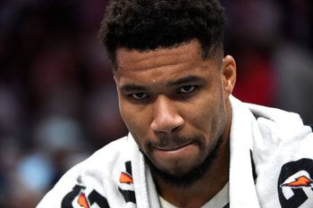 Dec 29, 2025; Charlotte, North Carolina, USA;  Milwaukee Bucks forward Giannis Antetokounmpo (34) in a time out during the second half against the Charlotte Hornets at the Spectrum Center. Mandatory Credit: Sam Sharpe-Imagn Images