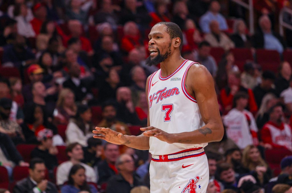 Dec 29, 2025; Houston, Texas, USA; Houston Rockets forward Kevin Durant (7) talks to a fan during a break against the Indiana Pacers in the third quarter at Toyota Center. Mandatory Credit: Thomas Shea-Imagn Images