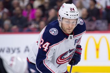 Dec 29, 2025; Ottawa, Ontario, CAN; Columbus Blue Jackets right wing Mathieu Olivier (24) gets in position for a faceoff in the second period against the Ottawa Senators at the Canadian Tire Centre. Mandatory Credit: Marc DesRosiers-IMAGN Images