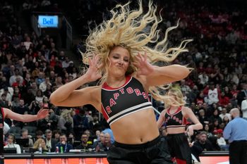 Dec 29, 2025; Toronto, Ontario, CAN;  A member of the  Toronto Raptors dance team performs during a break in the action against the Orlando Magic at Scotiabank Arena. Mandatory Credit: John E. Sokolowski-Imagn Images