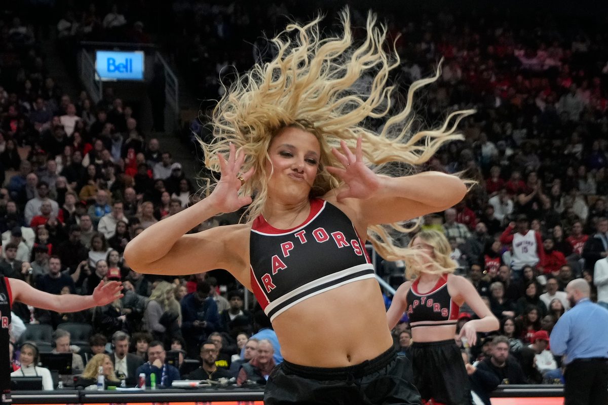 Dec 29, 2025; Toronto, Ontario, CAN; A member of the Toronto Raptors dance team performs during a break in the action against the Orlando Magic at Scotiabank Arena. Mandatory Credit: John E. Sokolowski-Imagn Images