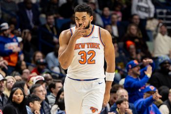 Dec 29, 2025; New Orleans, Louisiana, USA;  New York Knicks center/forward Karl-Anthony Towns (32) reacts to a play against the New Orleans Pelicans during the second half at Smoothie King Center. Mandatory Credit: Stephen Lew-Imagn Images