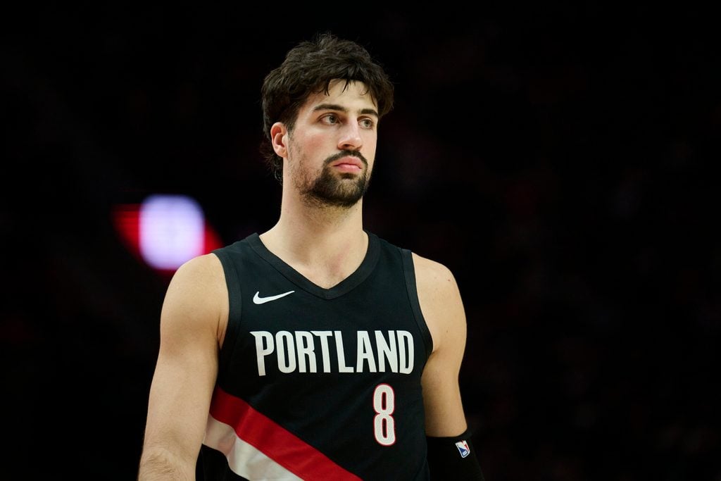 Dec 29, 2025; Portland, Oregon, USA; Portland Trail Blazers forward Deni Avdija (8) walks on the court during a break in the action during the second half against the Dallas Mavericks at Moda Center. Mandatory Credit: Troy Wayrynen-Imagn Images