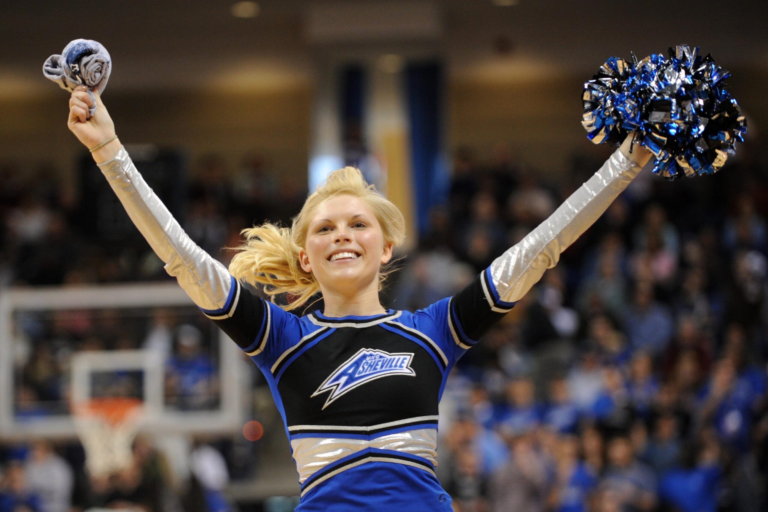 Mar 3, 2012; Asheville, NC, USA; North Carolina-Asheville Bulldogs cheerleader performs during the second half of the finals against the Virginia Military Keydets of the 2012 Big South Tournament at Kimmel Arena. UNC Asheville won 80 to 64. Mandatory Credit: Randy Sartin-Imagn Images