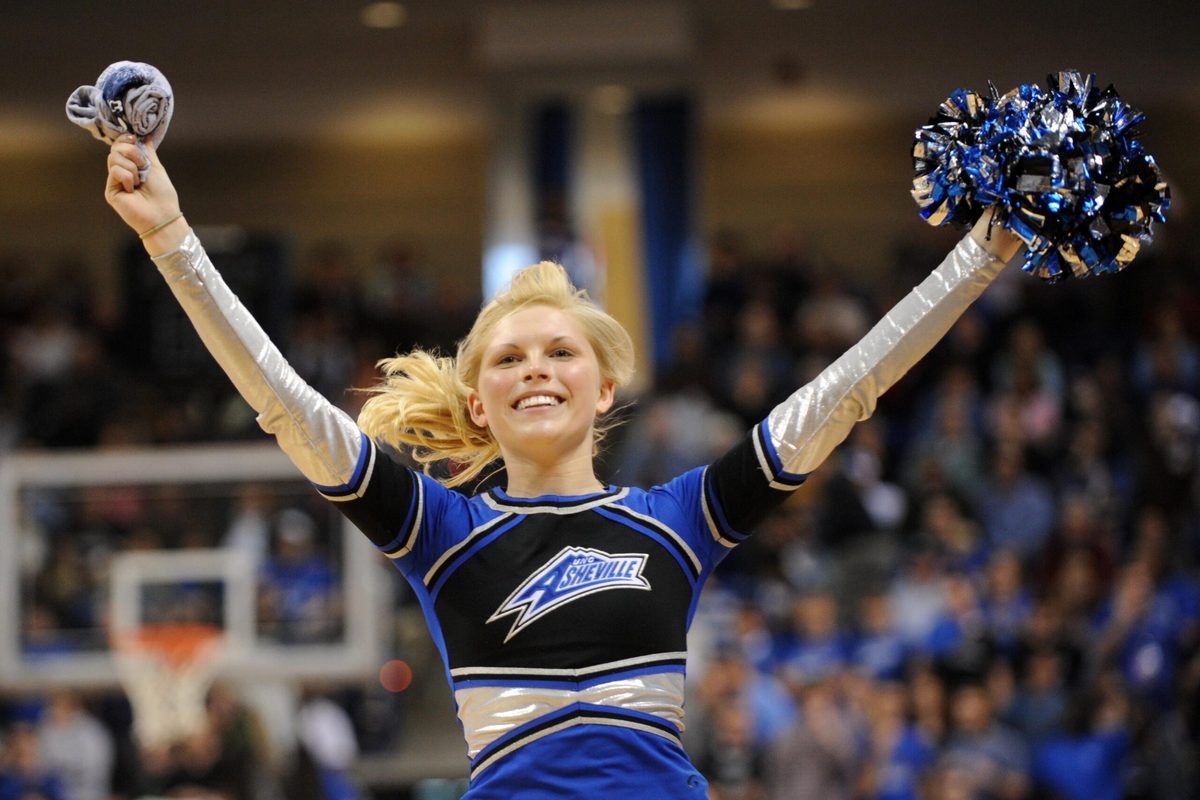Mar 3, 2012; Asheville, NC, USA; North Carolina-Asheville Bulldogs cheerleader performs during the second half of the finals against the Virginia Military Keydets of the 2012 Big South Tournament at Kimmel Arena. UNC Asheville won 80 to 64. Mandatory Credit: Randy Sartin-Imagn Images