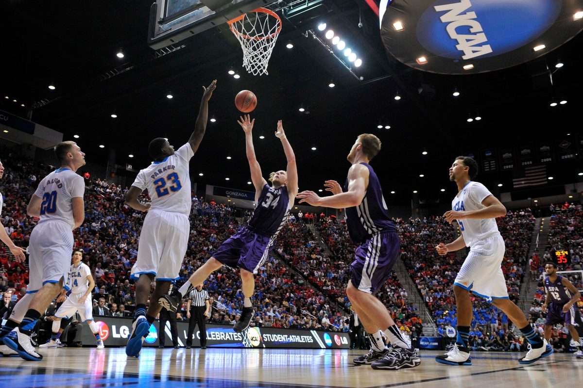 Mar 23, 2014; San Diego, CA, USA; Stephen F. Austin Lumberjacks forward Jacob Parker (34) shoots against the UCLA Bruins in the second half of a men's college basketball game during the third round of the 2014 NCAA Tournament at Viejas Arena. Mandatory Credit: Robert Hanashiro-Imagn Images
