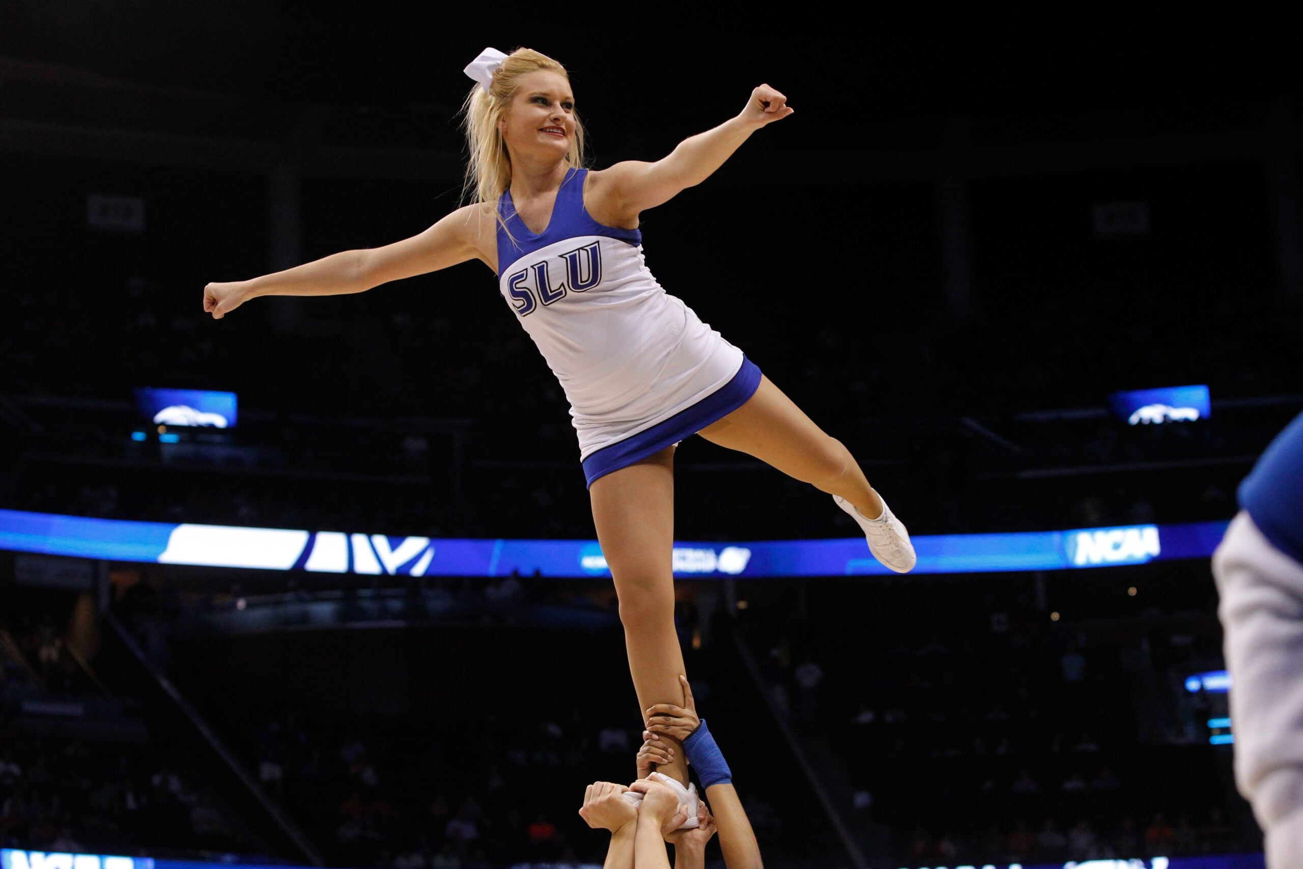 Mar 22, 2014; Orlando, FL, USA; Saint Louis Billikens cheerleader cheers against the Louisville Cardinals in the first half of a men's college basketball game during the third round of the 2014 NCAA Tournament at Amway Center. Mandatory Credit: Kim Klement-Imagn Images
