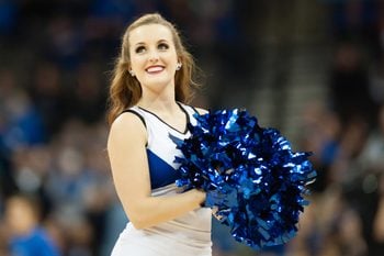 Nov 25, 2014; Omaha, NE, USA; A Creighton Bluejays cheerleader performs at CenturyLink Center Omaha. Mandatory Credit: Steven Branscombe-Imagn Images