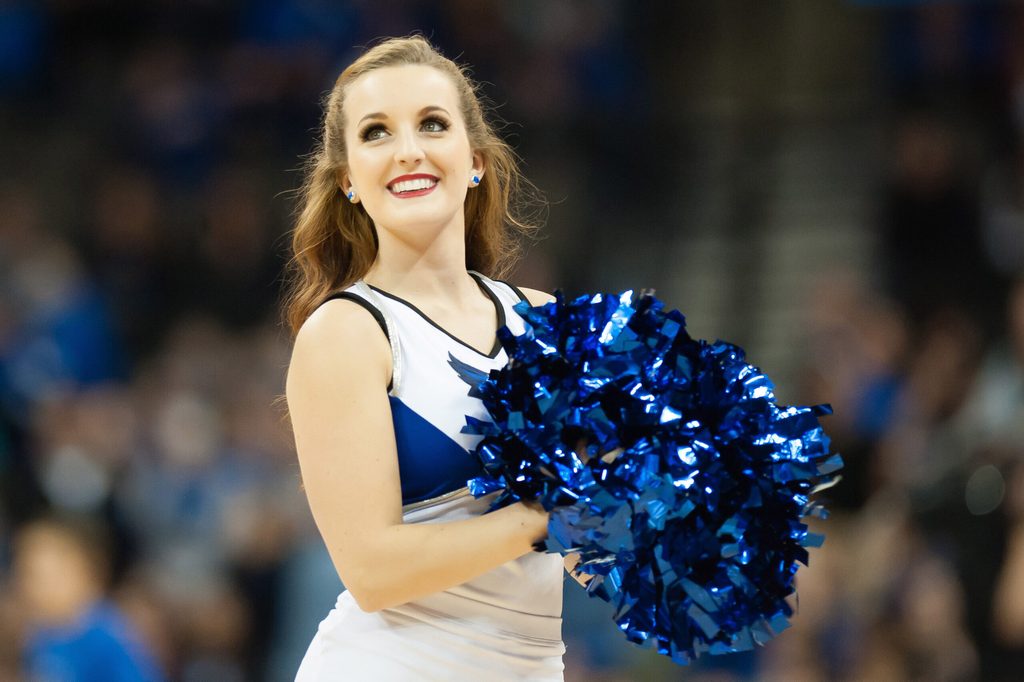 Nov 25, 2014; Omaha, NE, USA; A Creighton Bluejays cheerleader performs at CenturyLink Center Omaha. Mandatory Credit: Steven Branscombe-Imagn Images