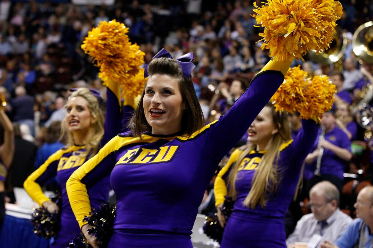 Mar 7, 2015; Uncasville, CT, USA; The East Carolina Lady Pirates cheerleaders perform during a break in the action against the Temple Owls in the second half during the quarterfinal round of the American Conference Tournament at Mohegan Sun Arena. East Carolina defeated Temple 77-71. Mandatory Credit: David Butler II-Imagn Images