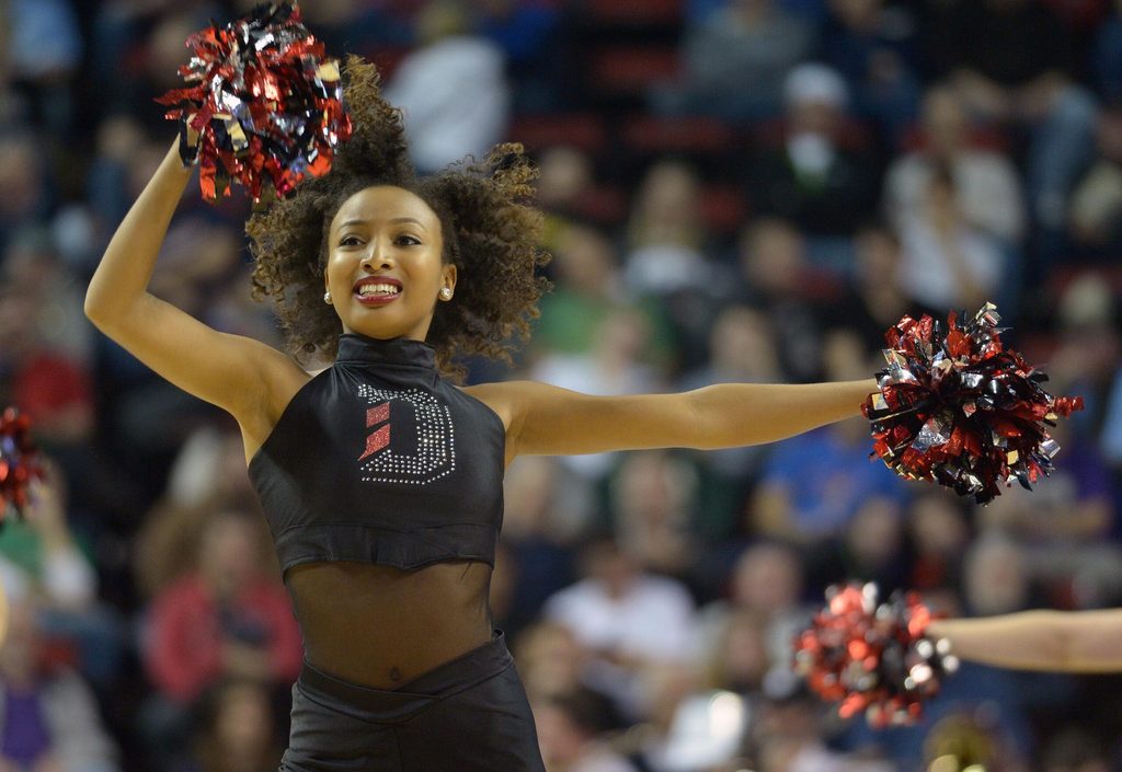 March 20, 2015; Seattle, WA, USA; March 20, 2015; Seattle, WA, USA; Davidson Wildcats cheerleader performs during the first half of the second round of the 2015 NCAA Tournament at KeyArena. Mandatory Credit: Kirby Lee-Imagn Images