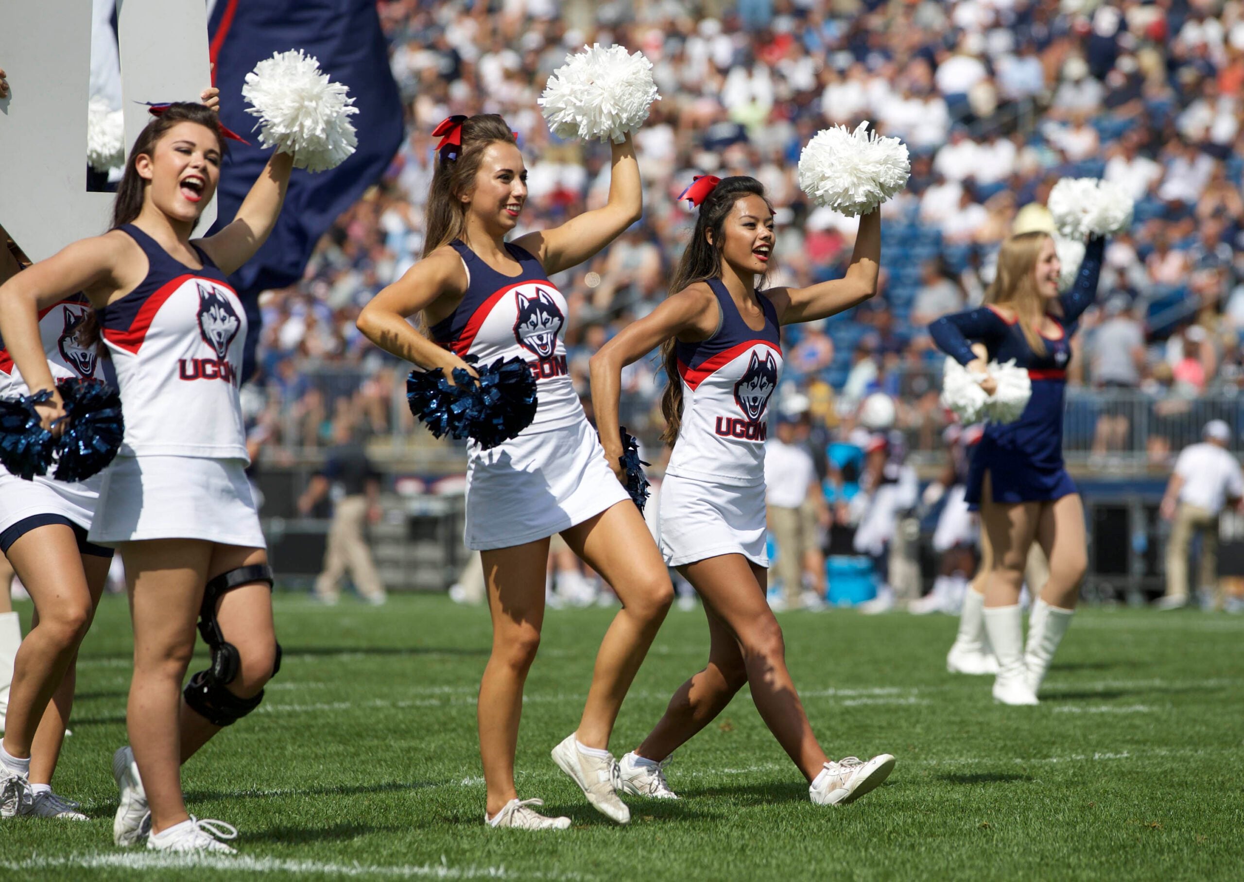 Sep 12, 2015; East Hartford, CT, USA; Connecticut Huskies cheerleaders perform during a break in the action against he Army Black Knights in the first half at Rentschler Field. Mandatory Credit: David Butler II-Imagn Images
