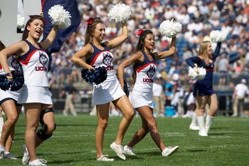 Sep 12, 2015; East Hartford, CT, USA; Connecticut Huskies cheerleaders perform during a break in the action against he Army Black Knights in the first half at Rentschler Field. Mandatory Credit: David Butler II-Imagn Images