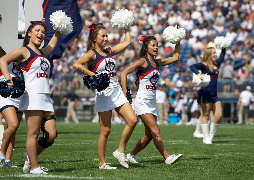 Sep 12, 2015; East Hartford, CT, USA; Connecticut Huskies cheerleaders perform during a break in the action against he Army Black Knights in the first half at Rentschler Field. Mandatory Credit: David Butler II-Imagn Images