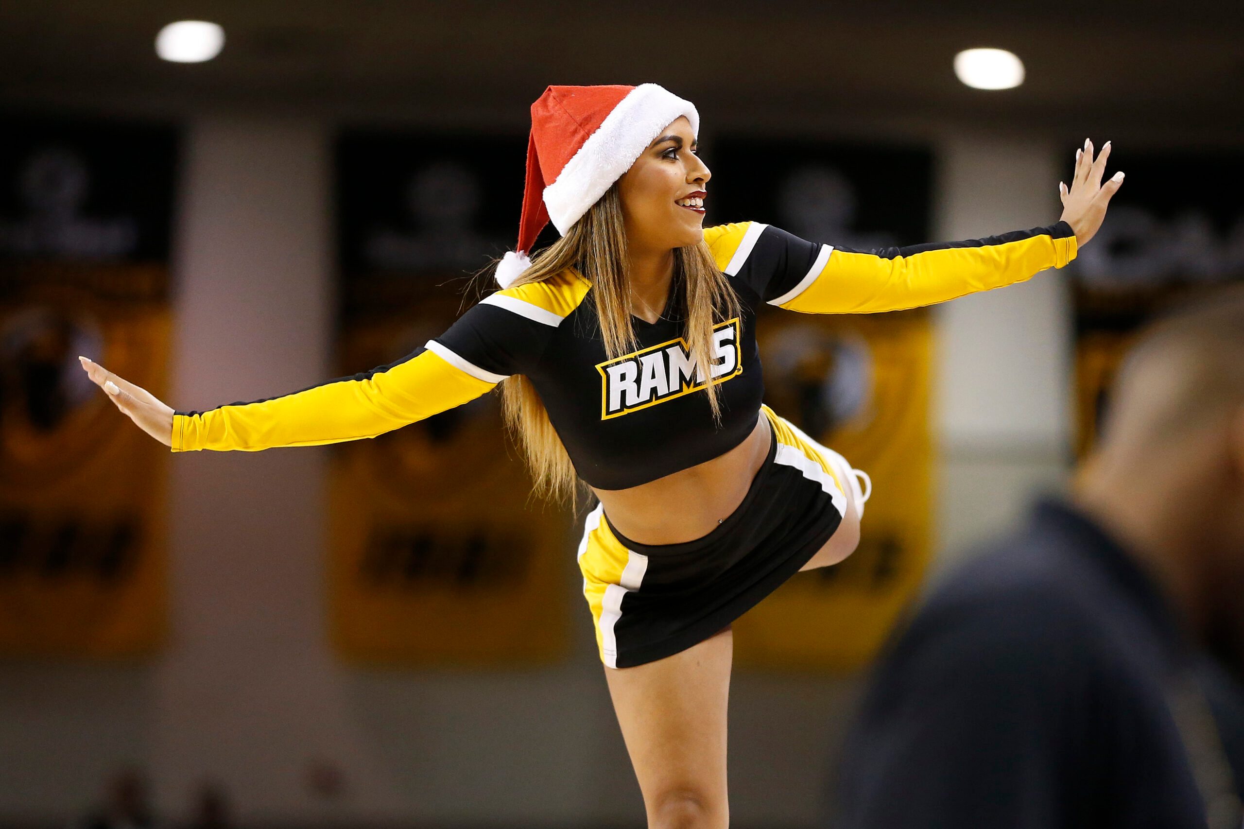 Dec 22, 2015; Richmond, VA, USA; A Virginia Commonwealth Rams cheerleader performs during a stoppage in play against the Buffalo Bulls in the first half at Stuart Siegel Center. The Rams won 90-69. Mandatory Credit: Amber Searls-Imagn Images