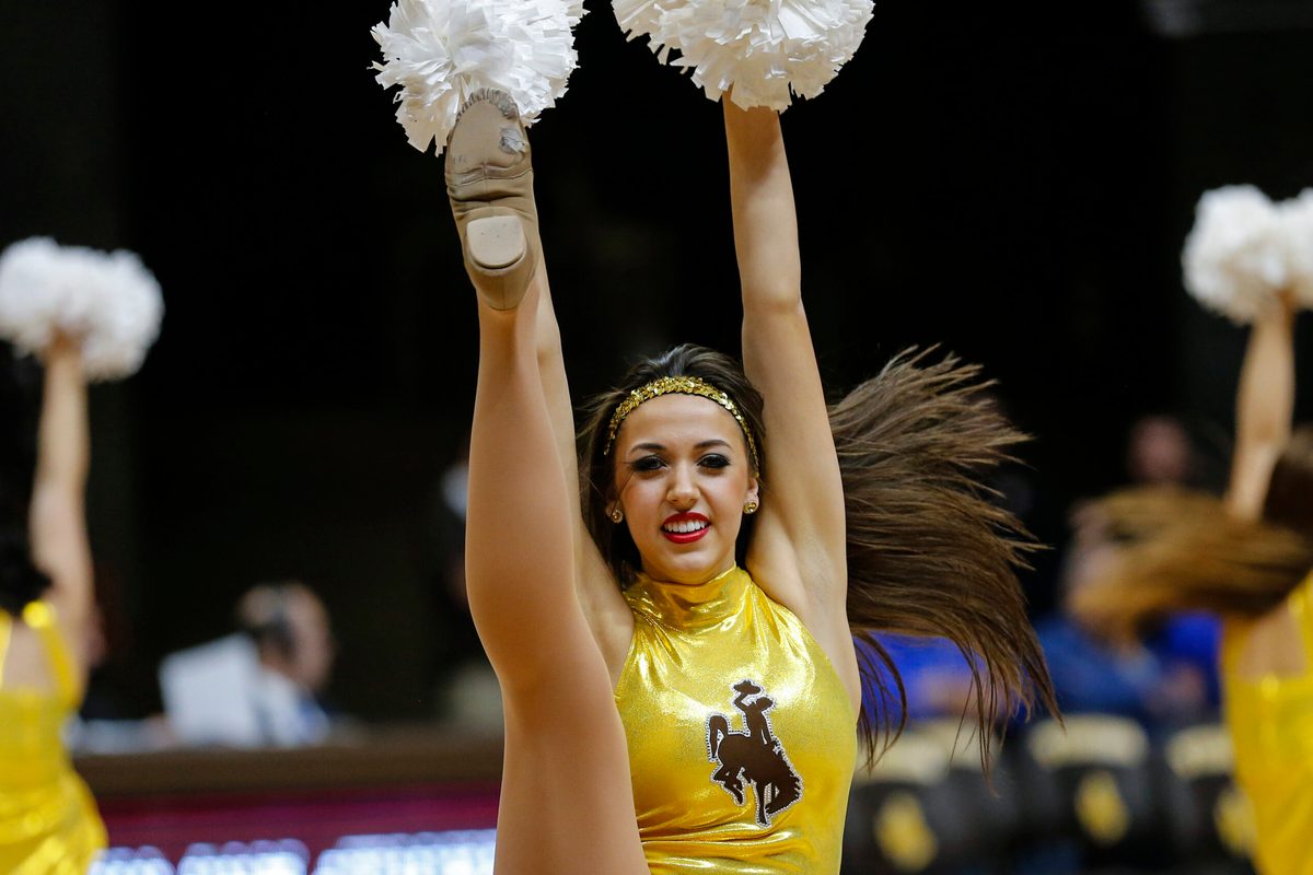 Jan 6, 2016; Laramie, WY, USA; A Wyoming Cowboys cheerleader performs against the Air Force Falcons during the second half at Arena-Auditorium. The Cowboys beat the Falcons 64-52. Mandatory Credit: Troy Babbitt-Imagn Images
