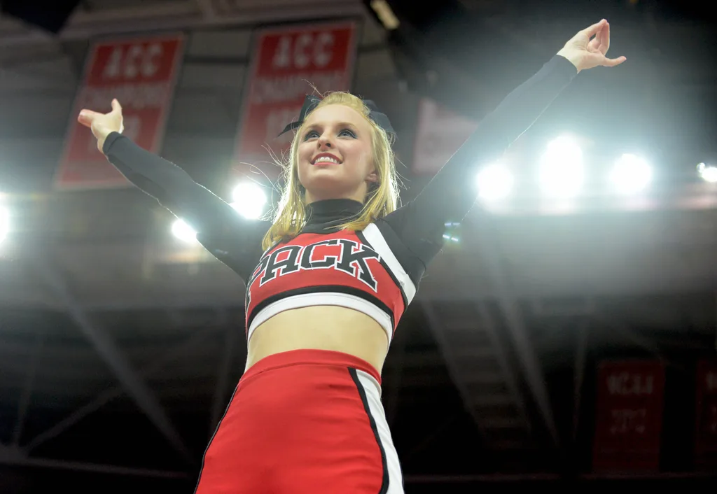 Feb 24, 2016; Raleigh, NC, USA; A North Carolina State Wolfpack cheerleader performs prior to the first half against the North Carolina Tar Heels at PNC Arena. Mandatory Credit: Rob Kinnan-Imagn Images