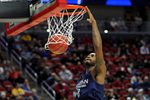 Mar 16, 2016; Des Moines, IA, USA; Connecticut Huskies guard Sam Cassell Jr. (10) dunks the ball during a practice day before the first round of the NCAA men's college basketball tournament at Wells Fargo Arena. Mandatory Credit: Steven Branscombe-Imagn Images