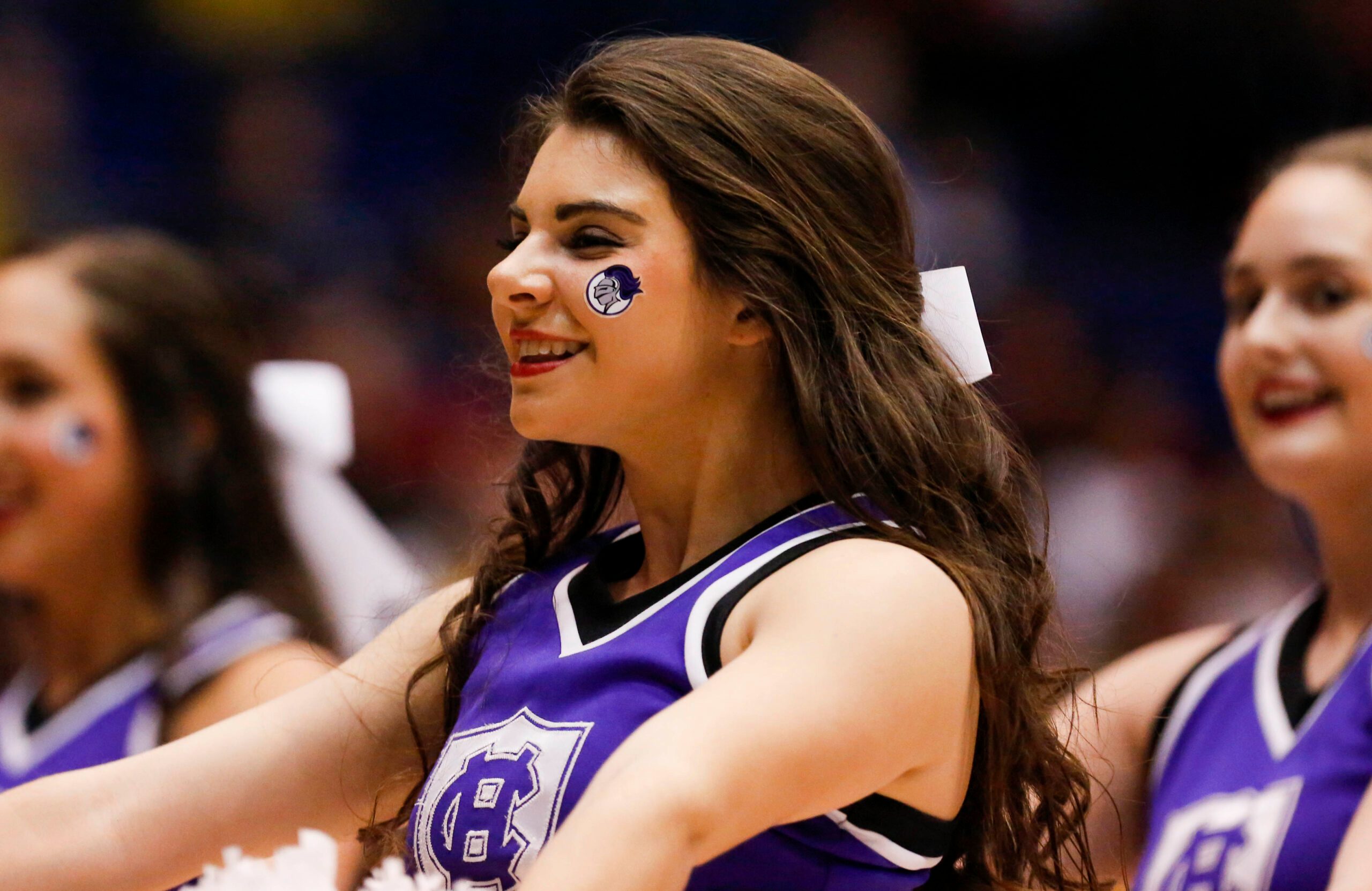 Mar 16, 2016; Dayton, OH, USA; Holy Cross Crusaders cheerleader performs during the first half against the Southern University Jaguars of the First Four of the NCAA men's college basketball tournament at Dayton Arena. Mandatory Credit: Rick Osentoski-Imagn Images