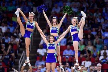 Mar 17, 2016; Raleigh, NC, USA; Florida Gulf Coast Eagles cheerleaders perform on the court during a stoppage in play against the North Carolina Tar Heels in the first half at PNC Arena. Mandatory Credit: Bob Donnan-Imagn Images