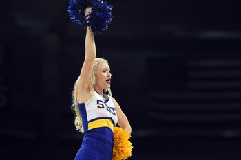 March 18, 2016; Spokane , WA, USA; South Dakota State Jackrabbits cheerleader performs during the first half at Spokane Veterans Memorial Arena. Mandatory Credit: Kyle Terada-Imagn Images