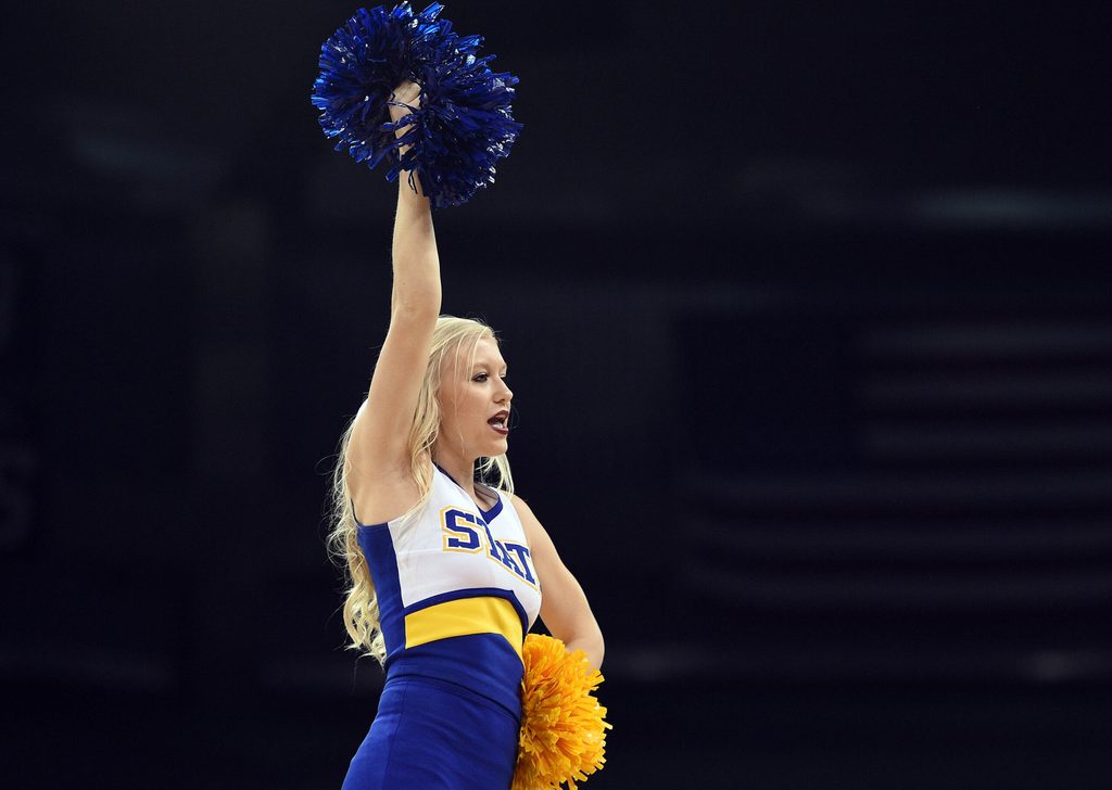 March 18, 2016; Spokane , WA, USA; South Dakota State Jackrabbits cheerleader performs during the first half at Spokane Veterans Memorial Arena. Mandatory Credit: Kyle Terada-Imagn Images