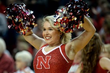 Dec 21, 2016; Lincoln, NE, USA; A Nebraska Cornhuskers cheerleaders performs during a break in the game against the Connecticut Huskies at Pinnacle Bank Arena. Mandatory Credit: Steven Branscombe-Imagn Images