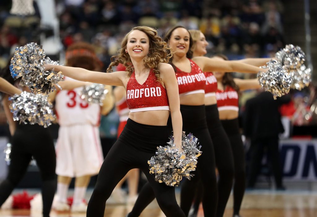 Mar 15, 2018; Pittsburgh, PA, USA; Radford Highlanders cheerleaders perform on the court in the first half against the Villanova Wildcats in the first round of the 2018 NCAA Tournament at PPG Paints Arena. Mandatory Credit: Geoff Burke-Imagn Images