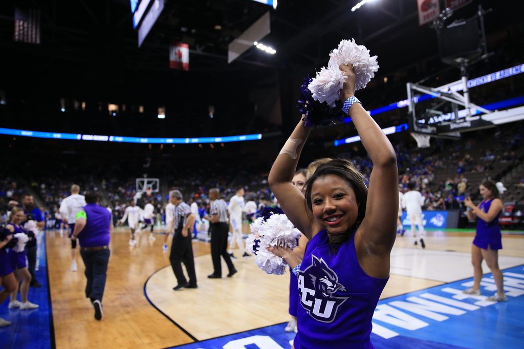 Mar 21, 2019; Jacksonville, FL, USA; The Abilene Christian Wildcats cheerleaders look on from the court prior to the first round of the 2019 NCAA Tournament against the Kentucky Wildcats at Jacksonville Veterans Memorial Arena. Mandatory Credit: Matt Stamey-Imagn Images