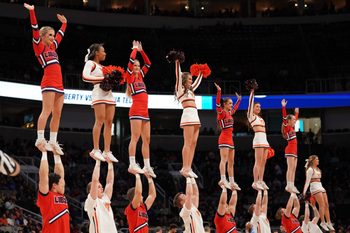 Mar 24, 2019; San Jose, CA, USA; Liberty Flames and Virginia Tech Hokies cheerleaders perform during the first half in the second round of the 2019 NCAA Tournament at SAP Center. Mandatory Credit: Kyle Terada-Imagn Images