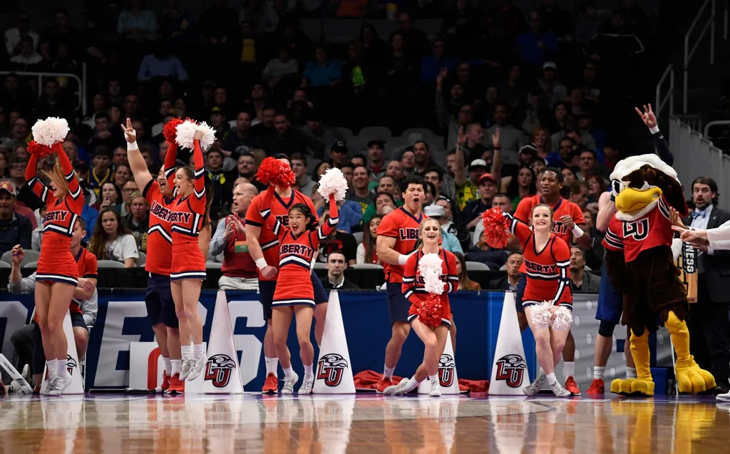 Mar 24, 2019; San Jose, CA, USA; Liberty Flames cheerleaders perform against the Virginia Tech Hokies during the first half in the second round of the 2019 NCAA Tournament at SAP Center. Mandatory Credit: Kelley L Cox-Imagn Images