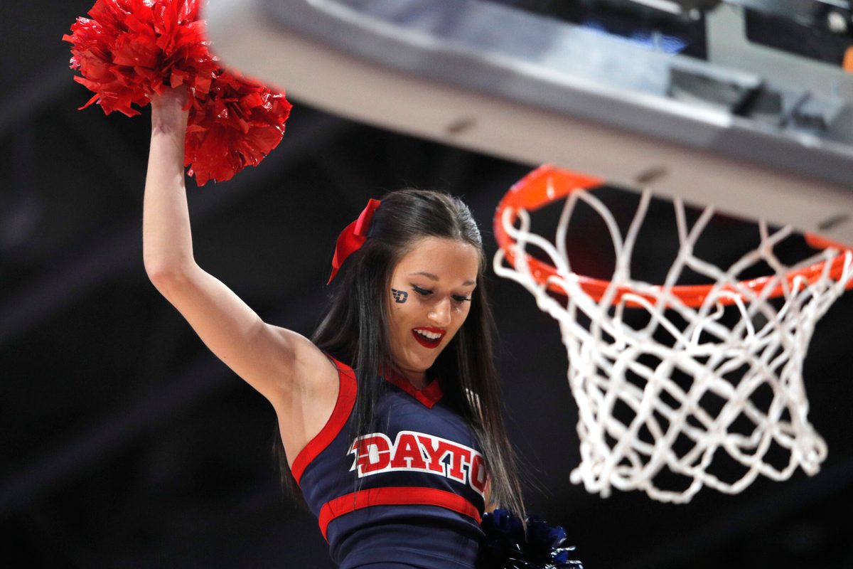 Feb 1, 2020; Dayton, Ohio, USA; A Dayton Flyers cheerleader performs during the second half against the Fordham Rams at University of Dayton Arena. Mandatory Credit: David Kohl-Imagn Images