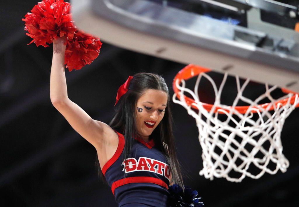Feb 1, 2020; Dayton, Ohio, USA; A Dayton Flyers cheerleader performs during the second half against the Fordham Rams at University of Dayton Arena. Mandatory Credit: David Kohl-Imagn Images