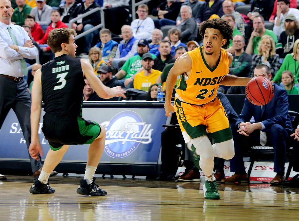 SIOUX FALLS, SD - MARCH 10: Jarius Cook #21 of the North Dakota State Bison drives baseline past Billy Brown #3 of the North Dakota Fighting Hawks during the men s championship game at the 2020 Summit League Basketball Tournament in Sioux Falls, SD. (Photo by Dave Eggen/Inertia)
Summit League Basketball Tournament