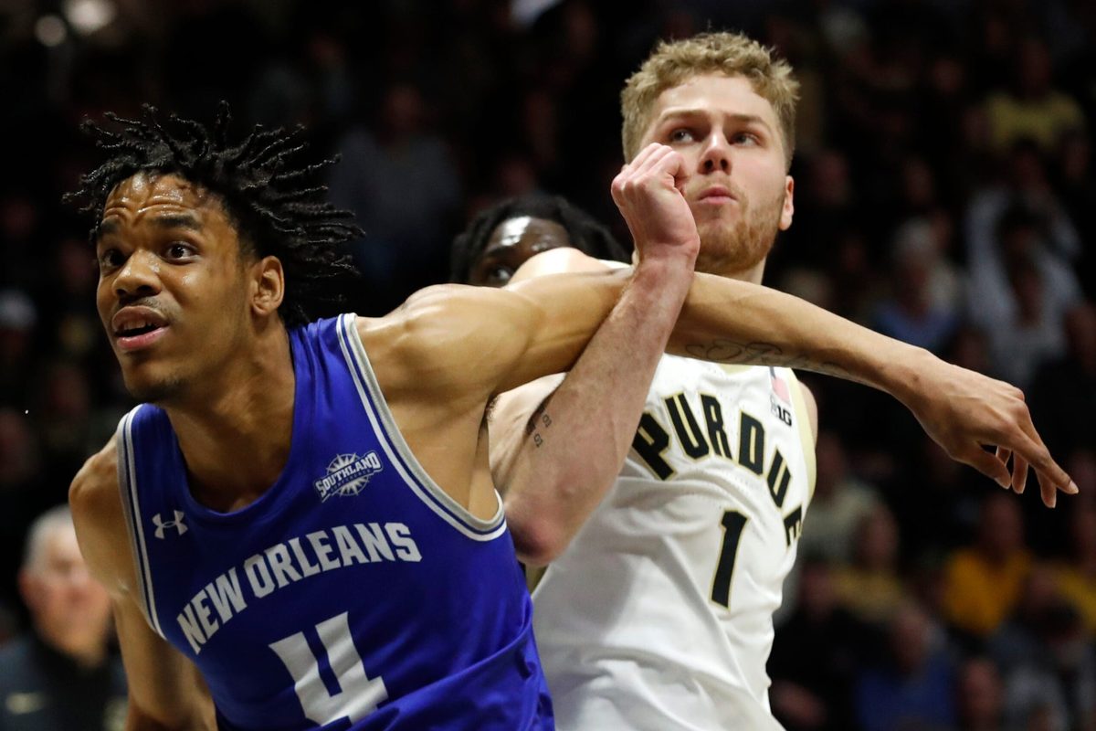 New Orleans Privateers forward Omarion Henry (4) boxes out Purdue Boilermakers forward Caleb Furst (1) during the NCAA men s basketball game, Wednesday, Dec. 21, 2022, at Mackey Arena in West Lafayette, Ind. Purdue won 74-53.
Purduenombb122122 Am00807