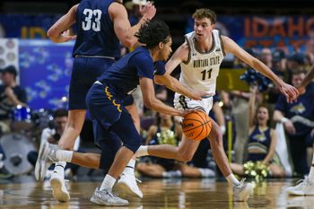 Mar 8, 2023; Boise, ID, USA; Montana State Bobcats guard Tyler Patterson (11) defends Northern Arizona Lumberjacks guard Xavier Fuller (2) during the first half at Idaho Central Arena. Mandatory Credit: Brian Losness-Imagn Images