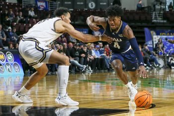 Mar 8, 2023; Boise, ID, USA; Northern Arizona Lumberjacks guard Oakland Fort (4) drives during the second half against Montana State Bobcats at Idaho Central Arena. Montana State defeated Northern Arizona 85-78. Mandatory Credit: Brian Losness-Imagn Images