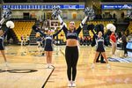 Mar 11, 2023; Towson, MD, USA; Monmouth Hawks cheerleaders cheer during the fourth quarter against the Northeastern Huskies at SECU Arena. Mandatory Credit: Emorej (Reggie) Hildred-Imagn Images