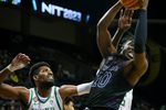 UC Irvine guard Ofure Ujadughele hauls in a rebound as the Oregon Ducks take on UC Irvine in their NIT opener Wednesday, March 15, 2023, at Matthew Knight Arena in Eugene, Ore.

Ncaa Basketball Oregon Men S Basketball Nit Opener Uc Irvine At Oregon