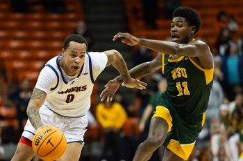 UTEP's Zid Powell (0) dribbles the ball at a men's basketball game against Norfolk State in the Sun Bowl Invitational on Wednesday, Dec. 20, 2023, at the Don Haskins Center in El Paso, Texas.