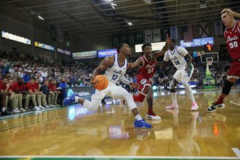 Action from a regular season game between the FGCU men  s basketball team and the #7 ranked FAU Owls at Alico Arena on Saturday, Dec. 30, 2023. FGCU stunned FAU 72-68.