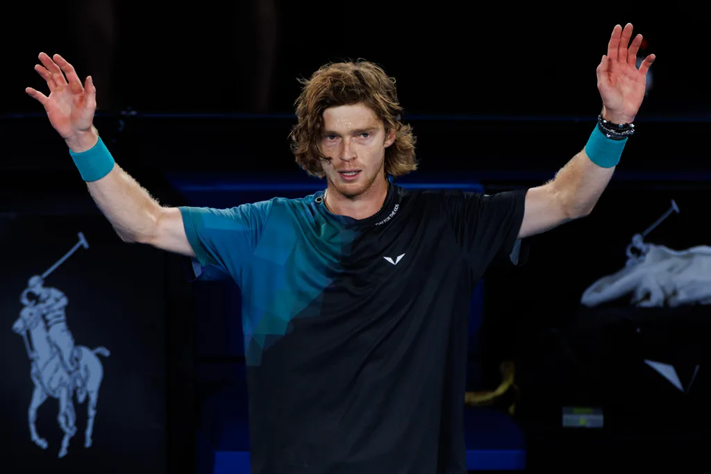Jan 21, 2024; Melbourne, Victoria, Australia; Andrey Rublev of Russia celebrates his victory over Alex de Minaur of Australia in the forth round of the men s singles at the Australian Open 2024. Mandatory Credit: Mike Frey-Imagn Images
