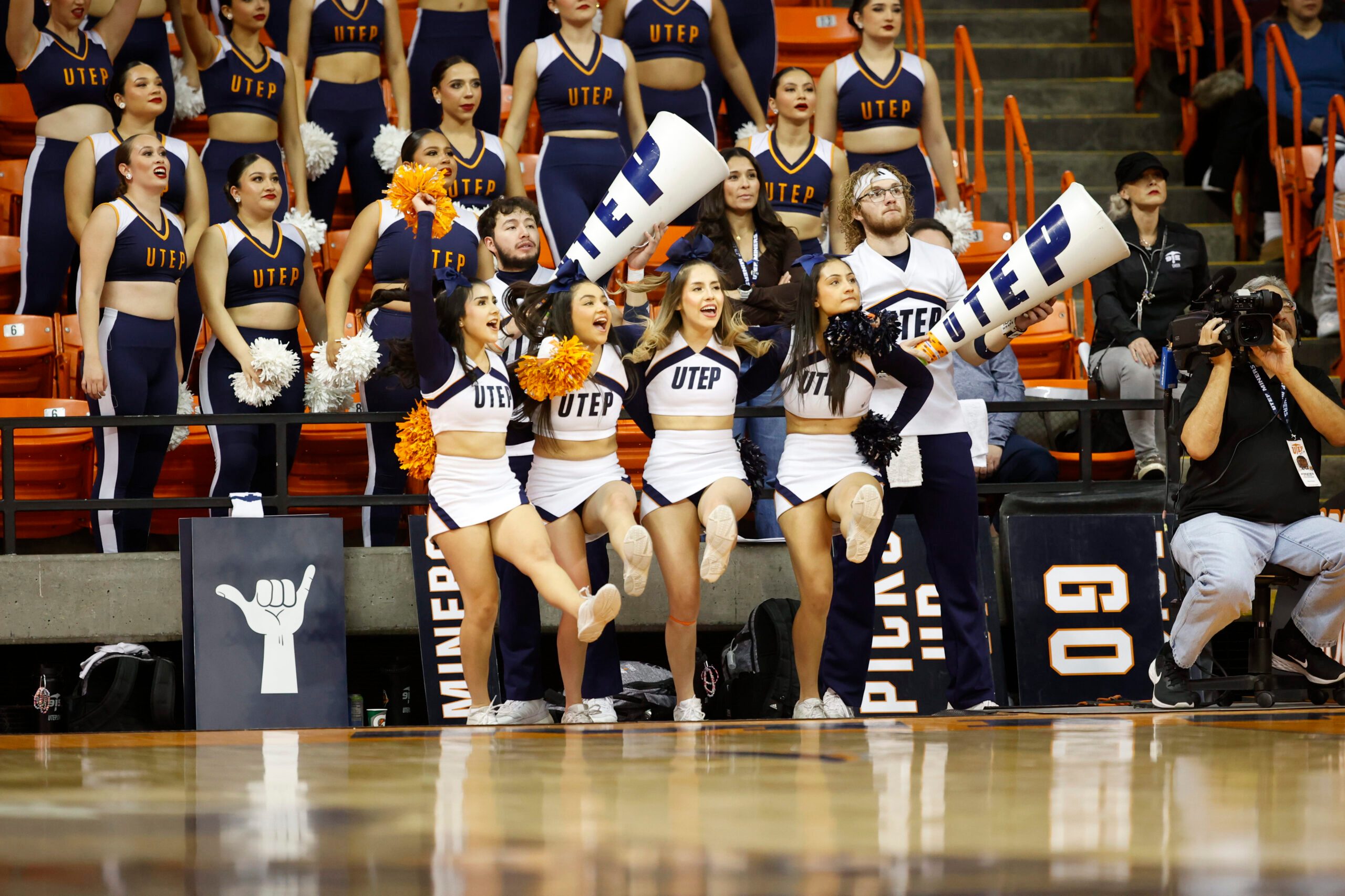 Feb 3, 2024; El Paso, Texas, USA; The UTEP Miners cheerleaders try to distract a Liberty University Flames free throw shooter as the in the second half at Don Haskins Center. Mandatory Credit: Ivan Pierre Aguirre-Imagn Images